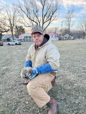 State Assemblyman Parker Space, who owns Space Farms in Wantage, holds a groundhog named Stonewall Jackson VI. (Photo by Caitlin Space)