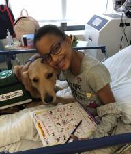 Patient Kayla with Professor. (Photo: Mount Sinai Kravis Children’s Hospital)