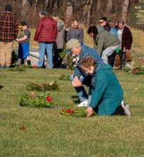 <b>Volunteers place wreaths on the graves at the Northern New Jersey Veterans Memorial Cemetery in Sparta in 2023. (File photo by Nancy Madacsi)</b>