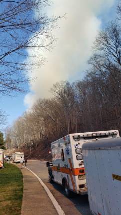 FIRE2 The fire continued to send smoke into the air Thursday, April 13. (Photo by Rich Adamonis)