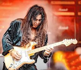 <b>Neo-classical guitarist Yngwie Malmsteen performs Saturday at the Newton Theatre. (Photo courtesy of Yngwie Malmsteen)</b>