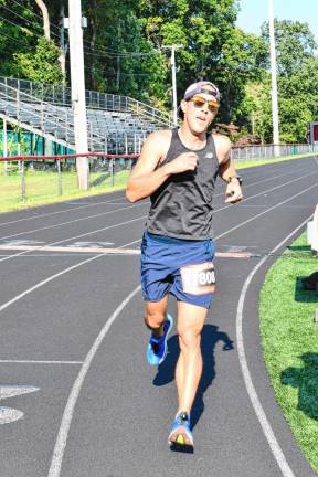 Lenape Valley Regional High School math teacher Peter Scholl, 33, of Sparta won the 5K with a time of 19 minutes 17.5 seconds.