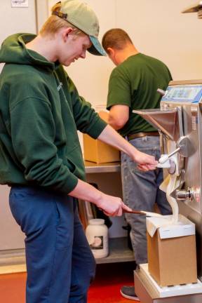 A teen working at Bellvale Farms Creamery in April, 2022. Photo by Sammie Finch.