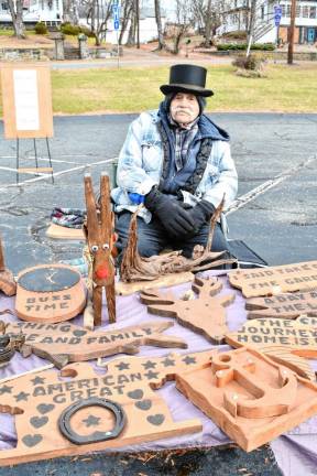 Vendors and crafters sell their wares.