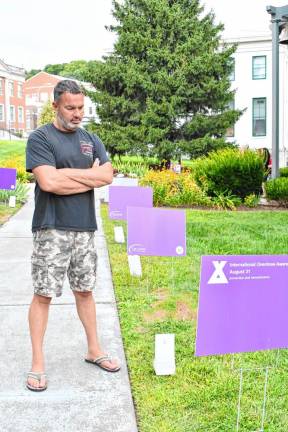 Kevin Gulick of Blairstown looks at one of the signs.