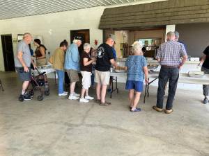 PC1 People line up for a barbecue lunch at the 10th annual veterans picnic, hosted by Sussex County Division of Senior Services, on Saturday, Aug. 19. (Photos by Daniele Sciuto)