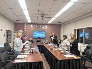 Danielle Gyles-Zito, Meghan Gill and Joan Faye are sworn in to three-year terms at the Newton Board of Education’s reorganization meeting Tuesday, Jan. 7. (Photos by Aidan Mastandrea)