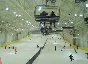 The chairlift suspended from the roof of BIG Snow carries skiers and riders to the top of the slope. (Photo by Dr. John T. Whiting)