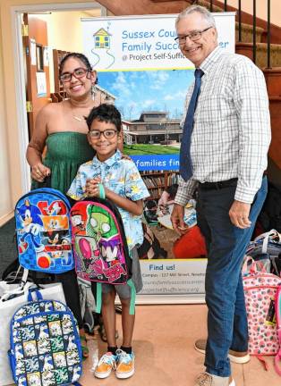 Jenice and Chase Camarena with Bruce Tomlinson, development director at Project Self-Sufficiency.