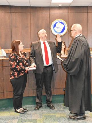 Matthew Dickson is sworn in as deputy mayor.