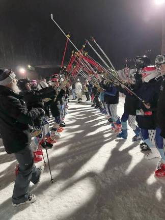 Raised poles tribute to seniors, Senior Night (Photo by Jen Campisi)