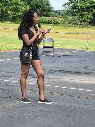 Brittany Barthelemy, H3AL’s director of outreach, performs at the Juneteenth celebration.