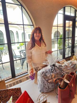 Ann Marie Gentilesco stands by the tricky tray items.