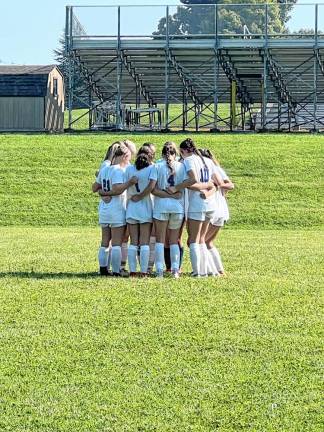 Soccer teams win openers