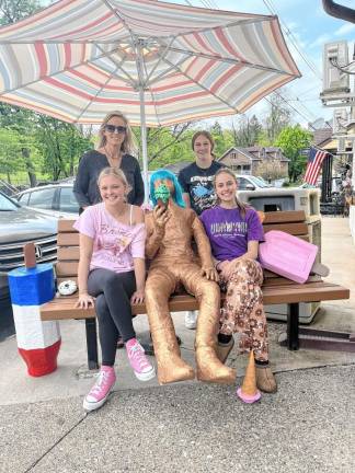 <b>Front row, from left, are Emily Morgan and Tessa Cope. Back row, from left, are Erin Meyers and Kelsey Birchenough at one of the Selfie Benches in Branchville.</b>