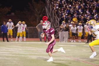 Newton running back Anthony Tudda on his way to the first of his three touchdowns in the quarterfinal round of the state sectional tournament. He rushed for 218 yards as the Braves defeated Lyndhurst, 33-30, at home Friday, Oct. 27. (Photo by George Leroy Hunter)