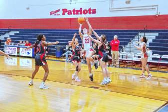 High Point's Ashley Schell leaps during a shot in the second half of the game against Lenape Valley on Jan. 10. The Patriots won, 49-37. (Photos by George Leroy Hunter)