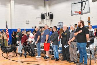 Veterans recite the Pledge of Allegiance during the veterans recognition program Wednesday, Nov. 6 at Valley Road School in Stanhope. (Photo by Maria Kovic)