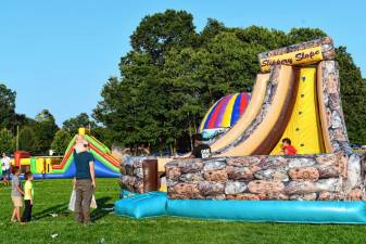 Children on an inflatable slide Saturday, Aug. 24 at Byram Fest 2024. (Photos by Maria Kovic)