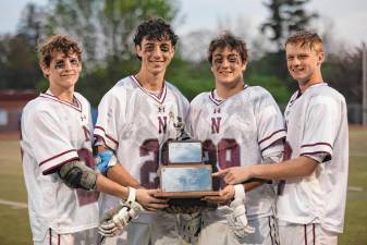 From left, Brenden Lynch, Yasin Tabatabaee, Dylan Cotter and Evan Parker were the seniors on the Newton High School boys lacrosse team. (Photos by Jordan Short)