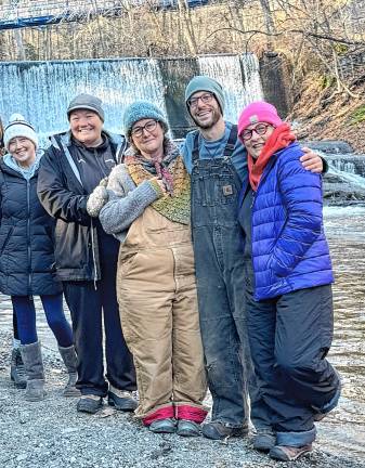 Posing after their plunge are, from left, Allison Reynolds, Amanda Marra, Lisa Hess, Matt Studer and Barbara Cooper.