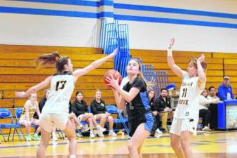 Kittatinny’s Gianna Caruso looks up just before a shot attempt in the first round of the NJSIAA North 1 Group 1 Sectional Tournament last season. She is one of the three team captains this year. (File photo by George Leroy Hunter)