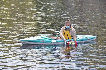 Alexandra of Troop 1151 Byram lays wreath on Cranberry Lake in memory of first responders and service members the community has lost. (Photo provided)