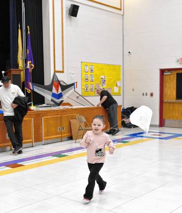 Isabella Wyka flies a kite Saturday, March 1 in the Byram Lakes School cafeteria. The South Jersey Kite Flyers held a kite building workshop. (Photos by Maria Kovic)