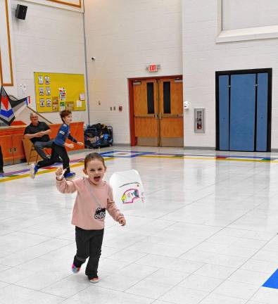 Isabella Wyka flies a kite.