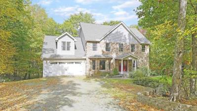 Custom four-bedroom colonial is elegant, with space and comfort