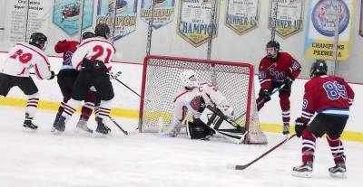 High Point-Wallkill Valley's goalkeeper Tai Ruvo guards the front of the goal post during action on the ice in the third period. Ruvo made 29 saves.