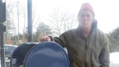 Ray Lines of Wantage, who is retired from the U.S. Postal Service, is pictured next to the Wantage Post Office drop box (Photo by Frances Ruth Harris)