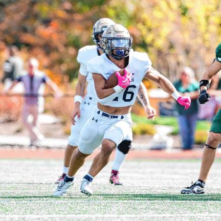 <b>Pope John running back Luke Gialanella cuts to his left through a big hole in the Delbarton defense. He made one touchdown during the game. (Photo by Glenn Clark)</b>