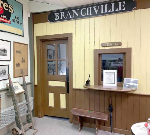 Mike Clune pieced together the ticket counter wall from the original train station.