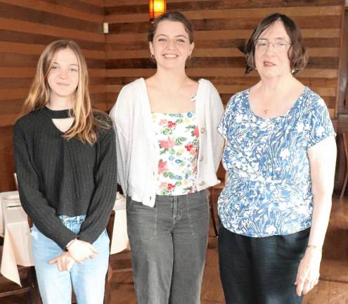 From left, Katya Daly and Brenna Loven with Linda Kalata, education chairwoman of the Hopatcong Woman’s Club. (Photo provided)