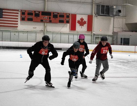 <b>Speed skaters Christopher McMullen, Avery Richardson, Kristina Pkhrikyan and Thomas Edward Hodnett compete in the Special Olympics on Tuesday, Feb. 4 at Skylands Ice World in Stockholm</b>. (Photo by Nancy Madacsi)