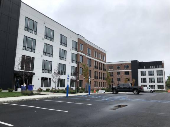 Water Street Lofts will have 100 units in three four-story buildings. The complex should be finished by the end of the year.