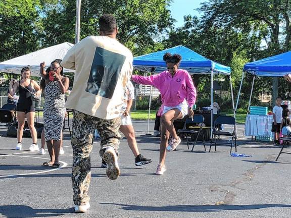 Resident dance during the Juneteenth Celebration in Newton.