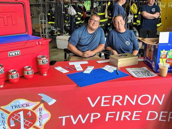 Jimmy Raperto and Jeanette Emmerich of the Vernon Township Fire Department, which benefited from the car show.