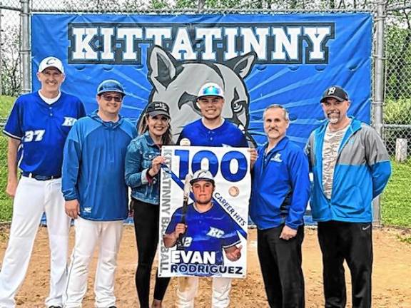 Evan Rodriguez, who scored his 100th hit during the season, poses with, from left, coaches BJ Hough and Mike Hoffmann; his mother, Evelyn; former head coach TJ Orlando; and his father, Raul. He was the first player in school history to accomplish that.