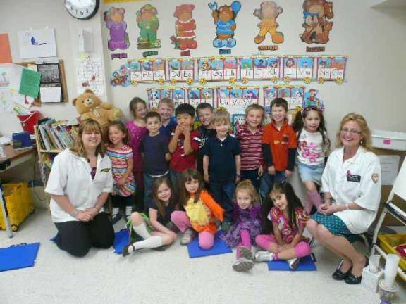 Patty Deckert (right), Head Pharmacist at Newton ShopRite, recently spoke to preschool students at the Rev. Brown School about drug safety.