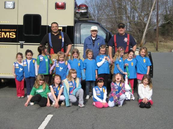 Photo Provided Girl Scout Troop 5624 with Fredon fire fighters.
