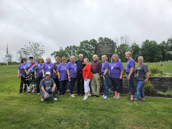 Members of the Snufftown Garden Club pose by the Blue Star Memorial Marker after the dedication ceremony June 24.