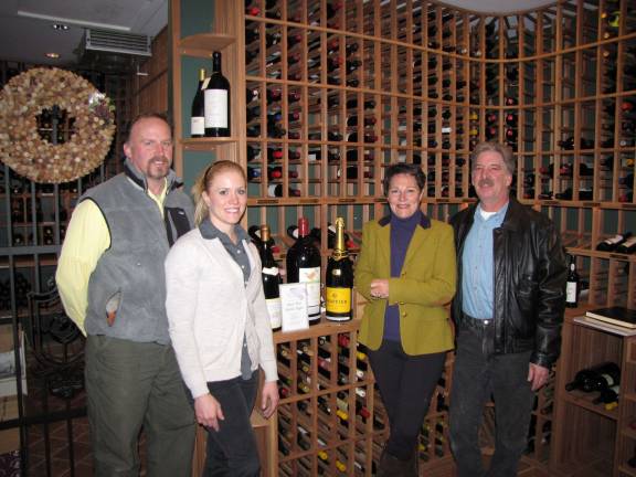 Photo Provided Project Self-Sufficiency Board President Beverly Gordon, Perona Farms Owner Kirk Avondoglio and Steve Polanish and Heather Lamberson of the Hudson Farm Club, prepare to celebrate Open That Bottle Night.