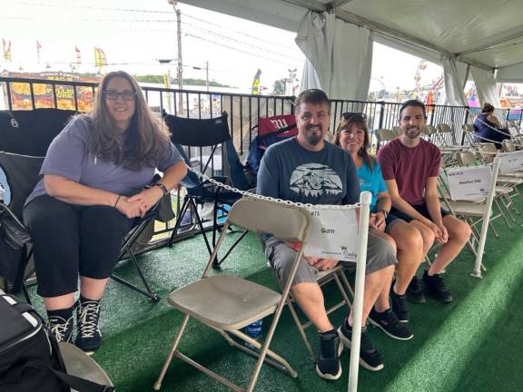 Sharon Gunn, left, is co-vice president of the committee. Next to her are Chris and Debbie DeVries and Chris DeVries Jr.