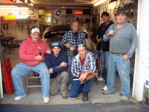 Team Plum Crazy members gather in Bedacht's shop in Franklin. From left, front row: Dave Yuppa, Jack Struller,Tommy Kuka. Standing: Frank Bedacht, Rene Vega, John Palazzolo.