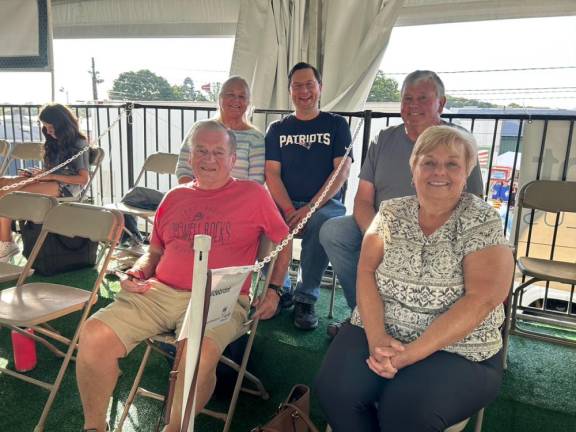 Bob Woods and Sue Hildebrand are in front. In back row, from left, are Nancy Woods, committee treasurer Jonathan Gryllis and Mark Hildebrand.