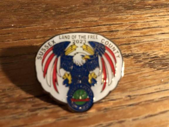 The veterans pin designed by Nicolas Pacheco.