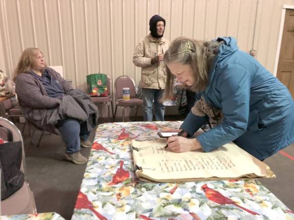 Giselle Smisko, right, of Wantage makes a list of the birds that were counted Saturday, Feb. 18 at the Wallkill River National Wildlife Refuge.