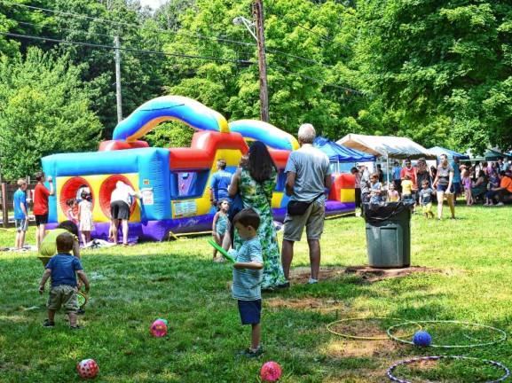 The event featured children’s activities, including a bounce house.